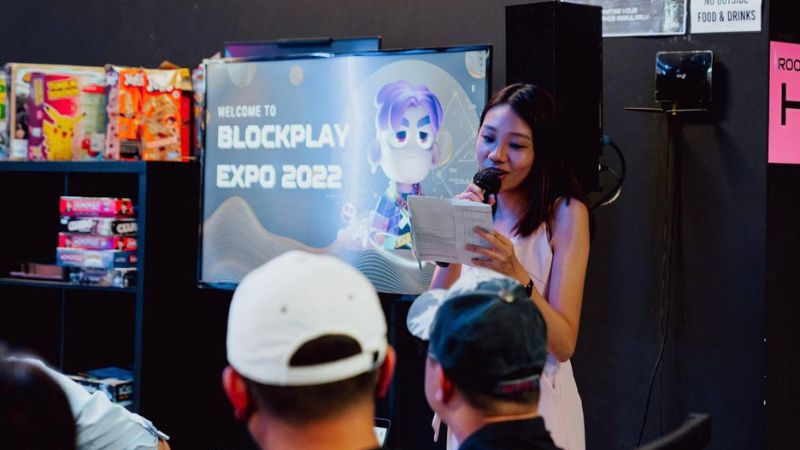 Crystal Tan speaking to an audience at BlockPlay Expo 2022